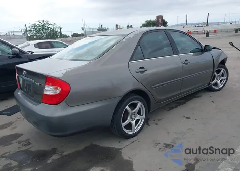 2003 Toyota Camry Le from USA, damaged, VIN 4T1BE32K03U732051